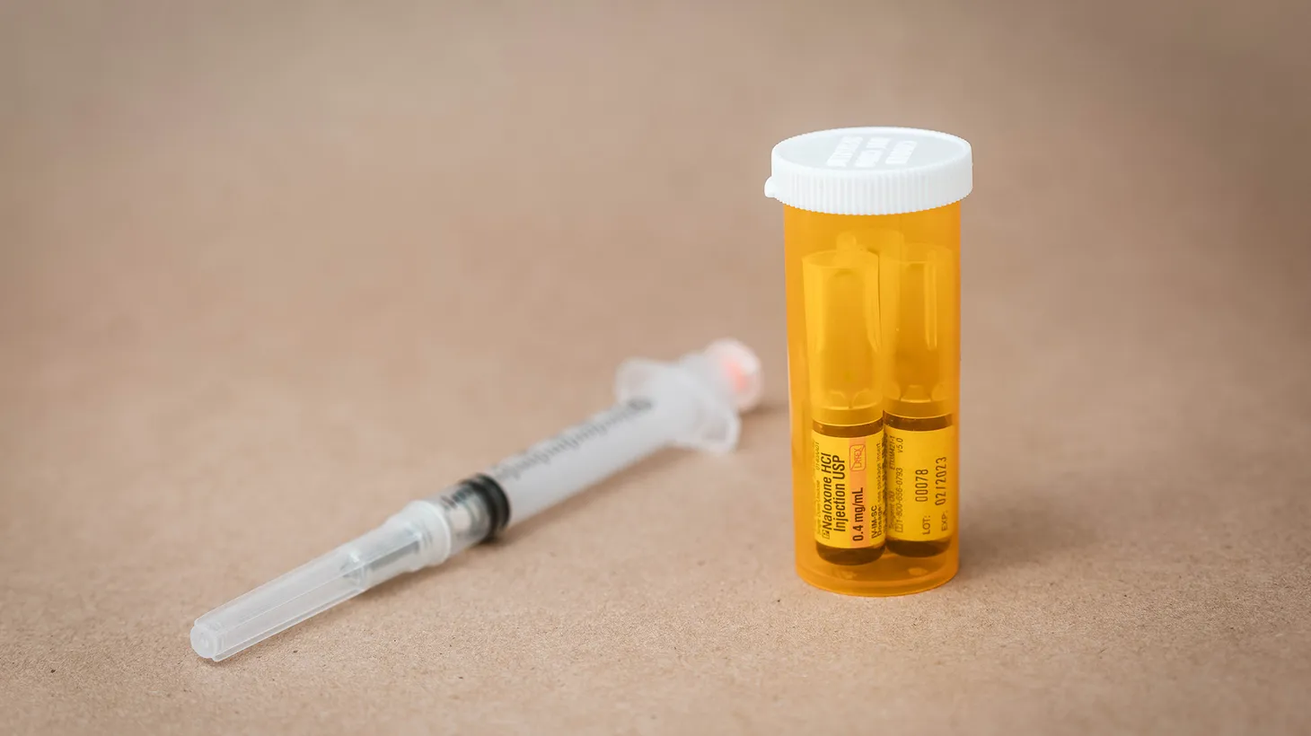 Vials of Naloxone, used by places like the now-closed Harm Reduction Institute to help people with heroin addiction, are seen with a syringe.