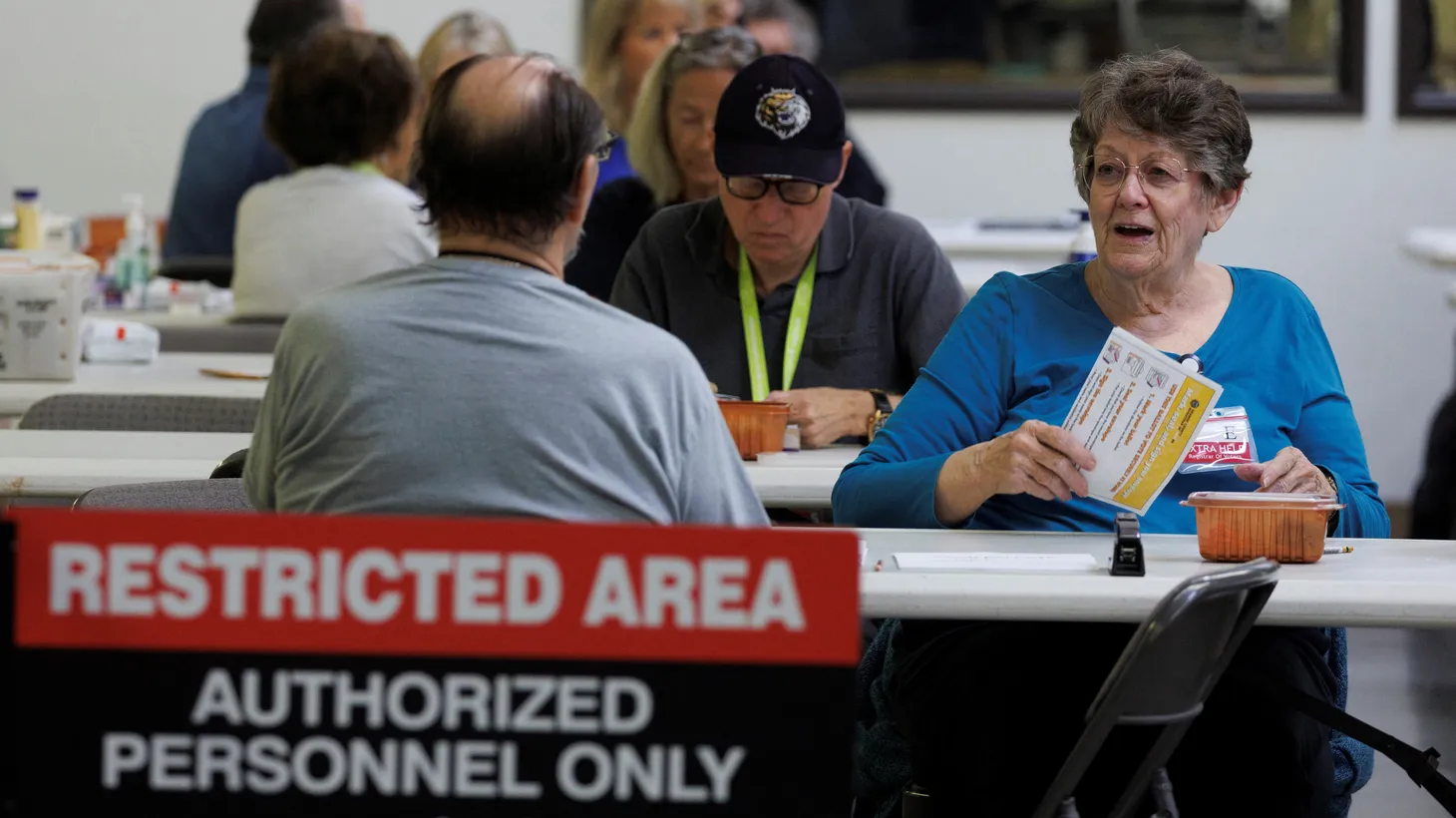 Election workers sort ballots at the Orange County Registrar of Voters in Santa Ana, California, U.S., November 1, 2022.
