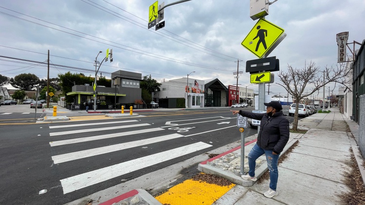 As LA makes safety improvements during rapid neighborhood development south of the 10 freeway, locals ask why now, and who are these changes meant to benefit?