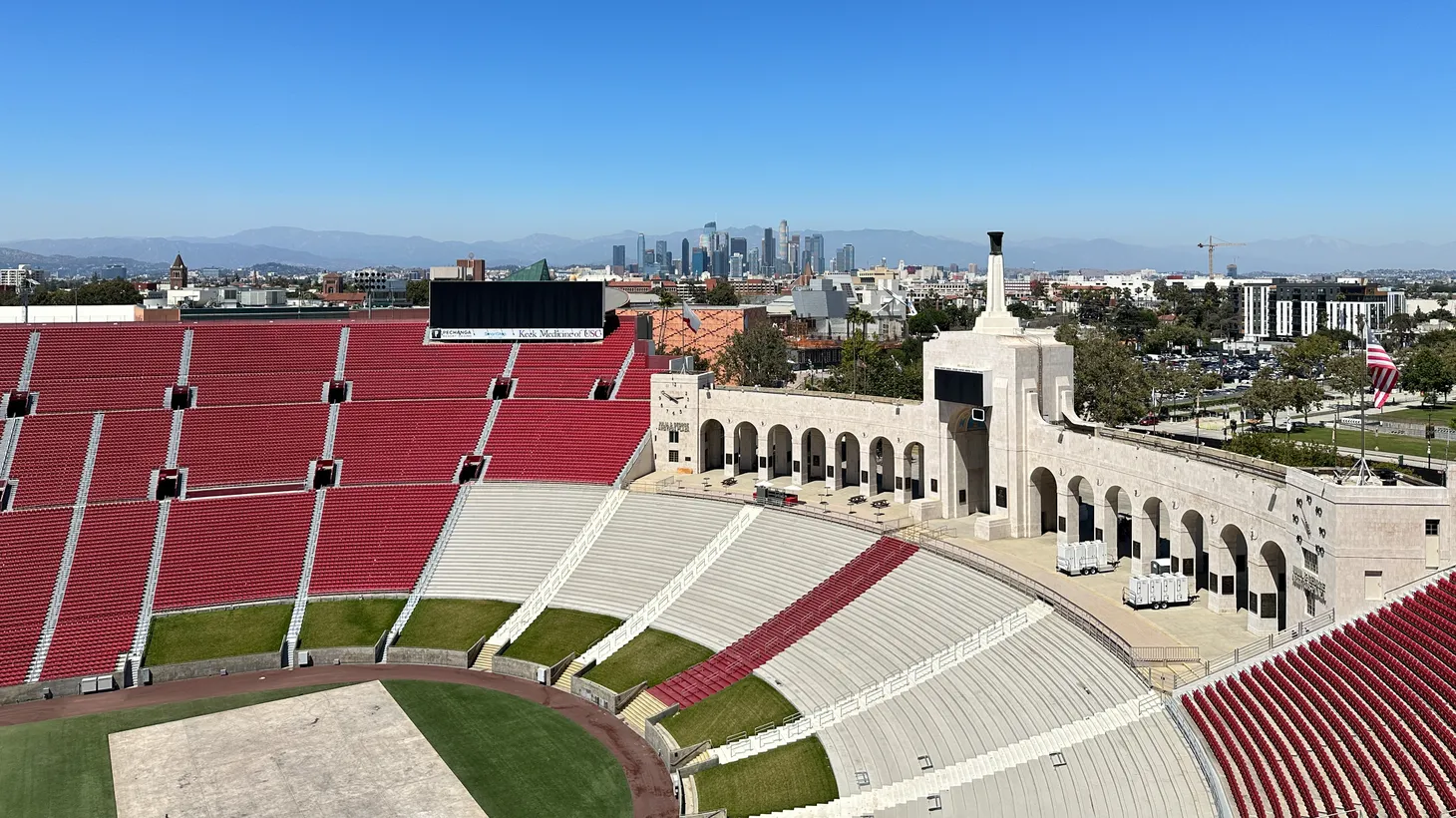 From inside the Coliseum, people can see downtown Los Angeles in the background.