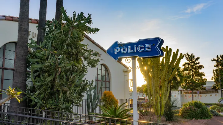 As the need for mental health services grows, Fullerton is testing a new way to de-escalate police encounters by bringing social workers into the 911 mix.