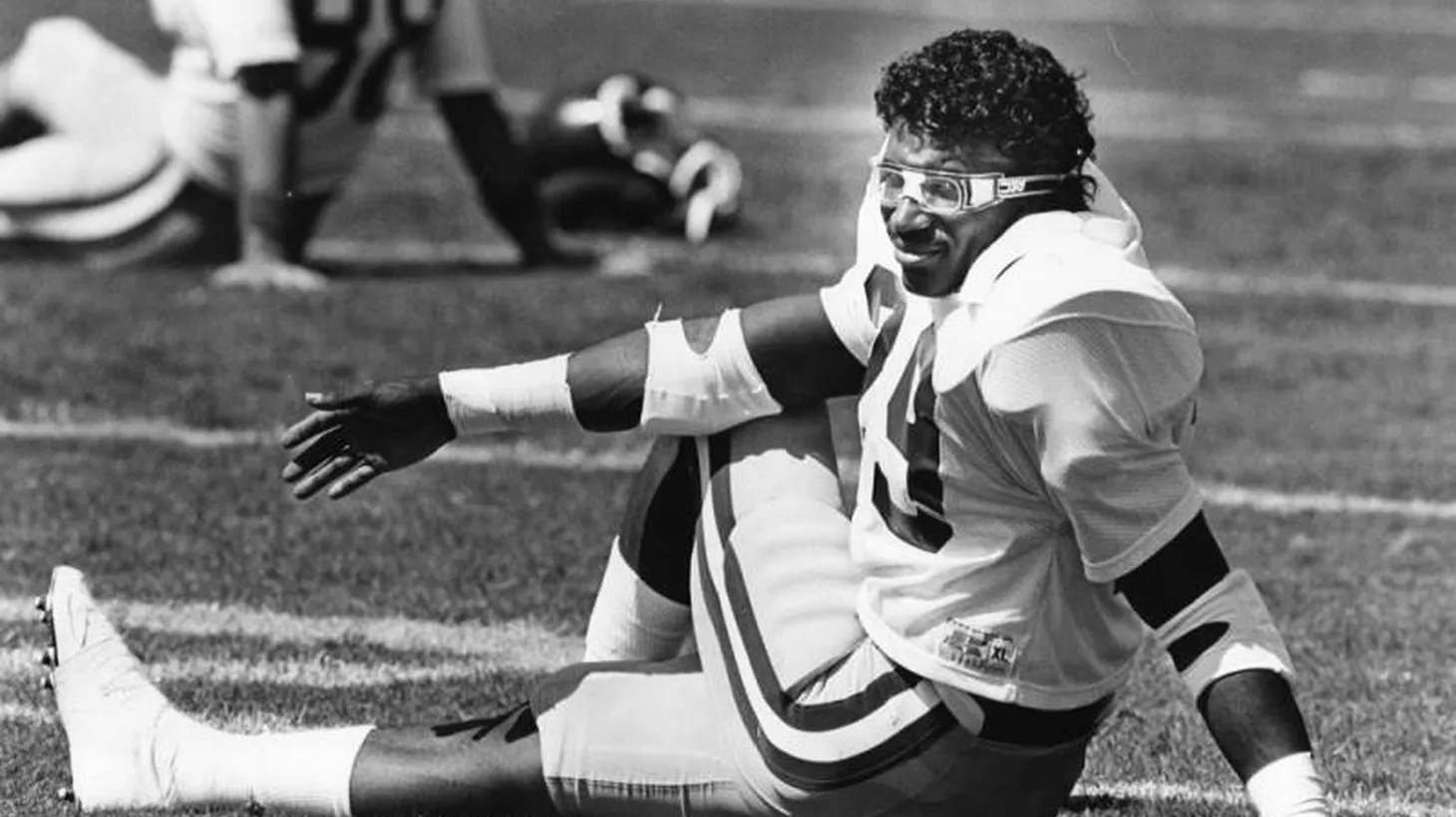 Rams player Eric Dickerson stretches his leg muscles on September 23, 1985.