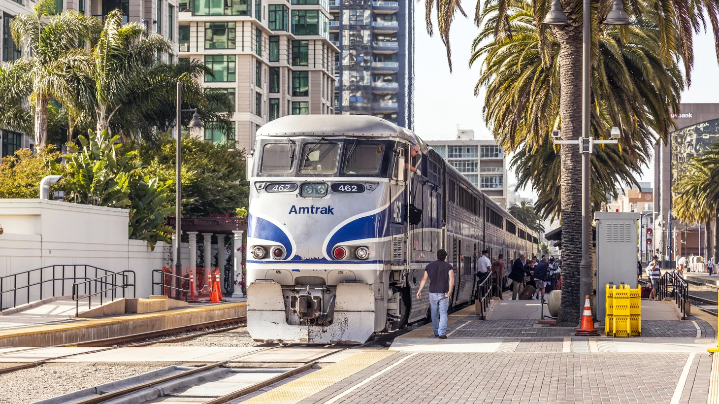 An Amtrak train is seen at Union Station in San Diego. “The coast has been eroding for decades, so where you used to have sand way out there, now the waves are actually starting to shift the rails themself,” says Gustavo Arellano.
