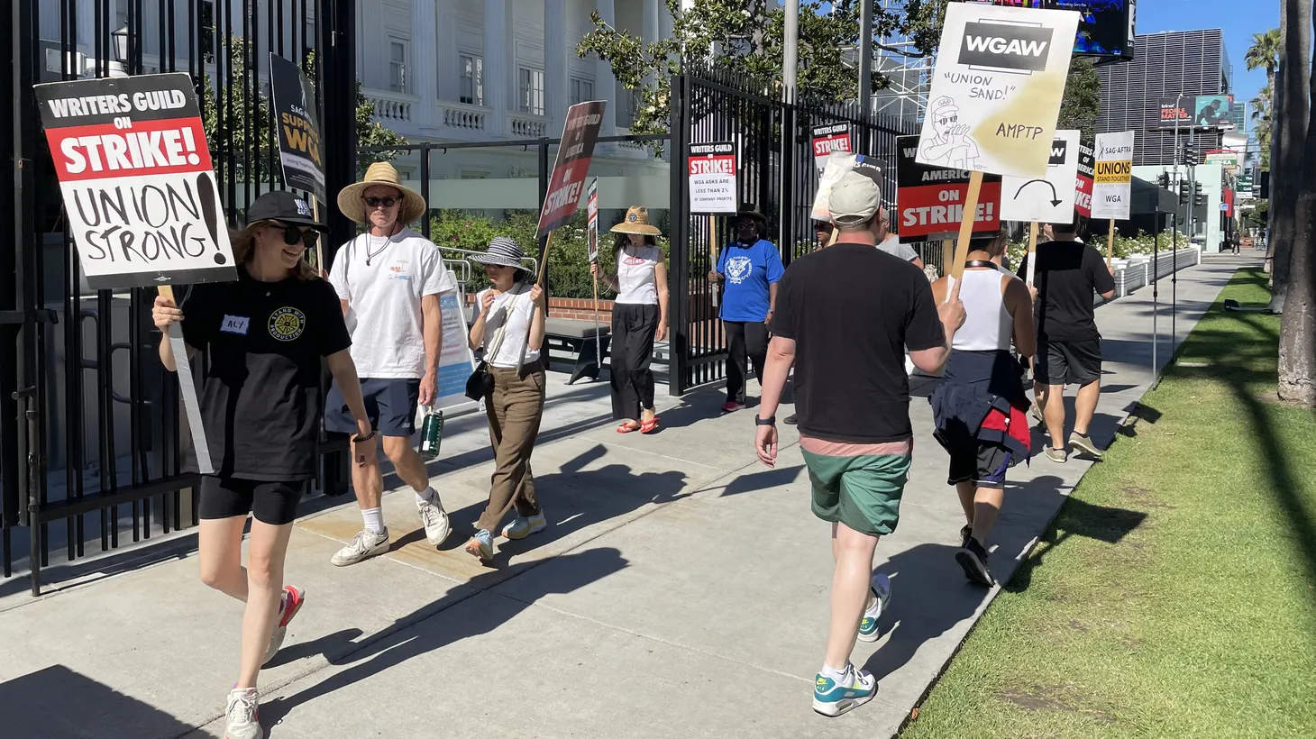 Striking writers walk a Writers Guild of America picket line outside of Netflix in Hollywood on July 13, 2023.