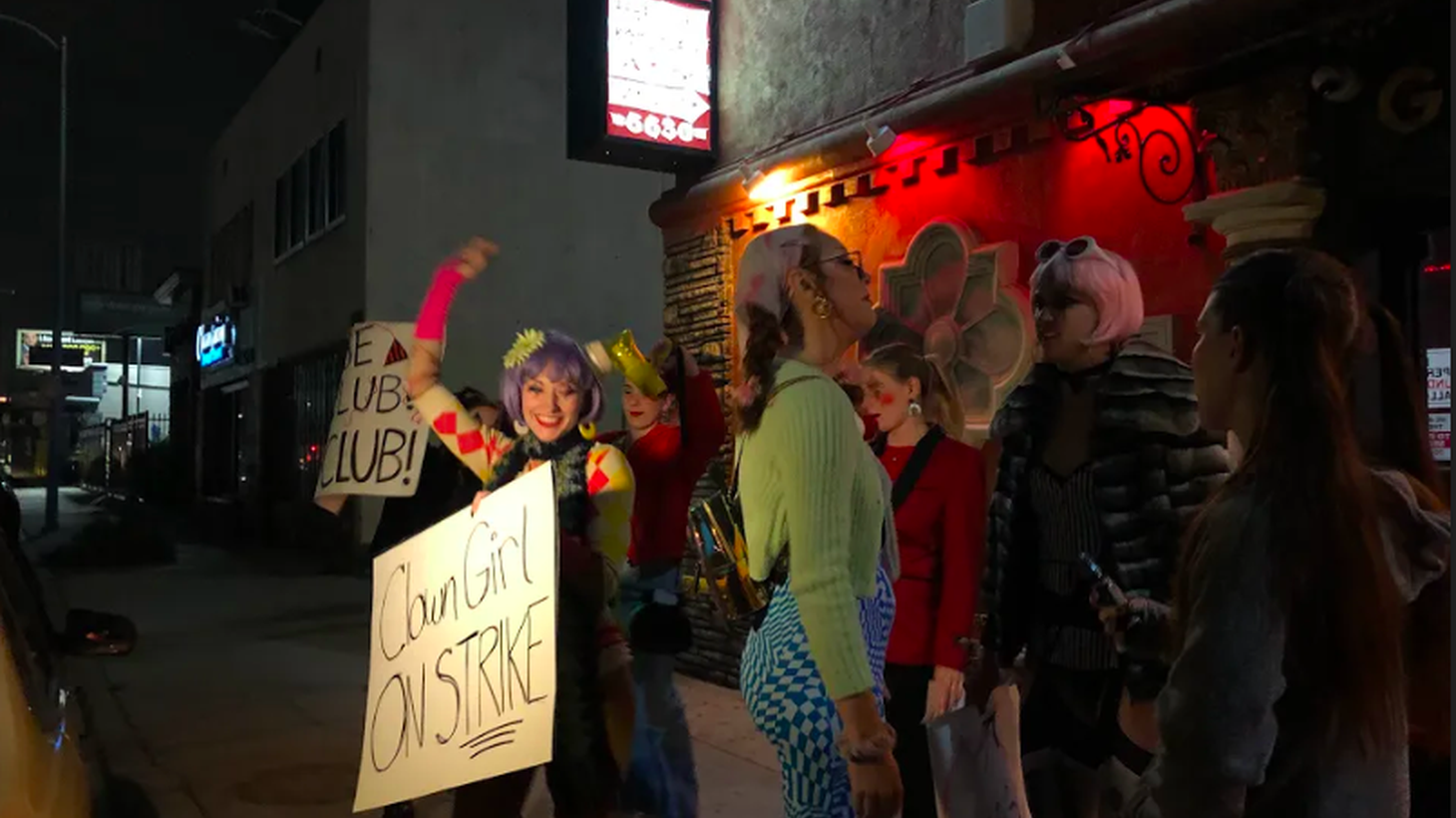 Reagan (left) and other dancers protest their employers at Star Garden Topless Dive Bar in North Hollywood in March.