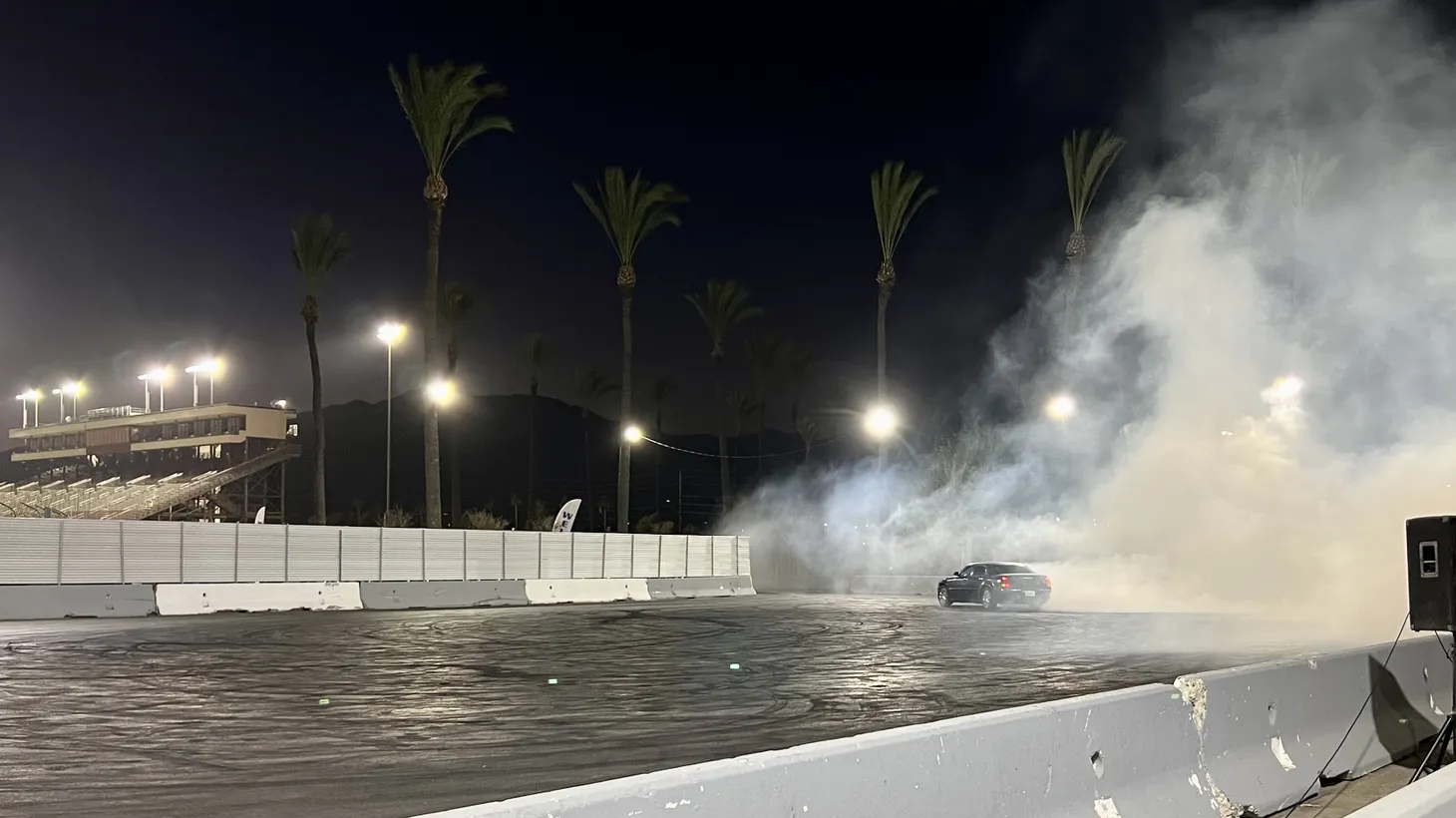 A driver squeals around in donuts in the burnout box at Irwindale Speedway.