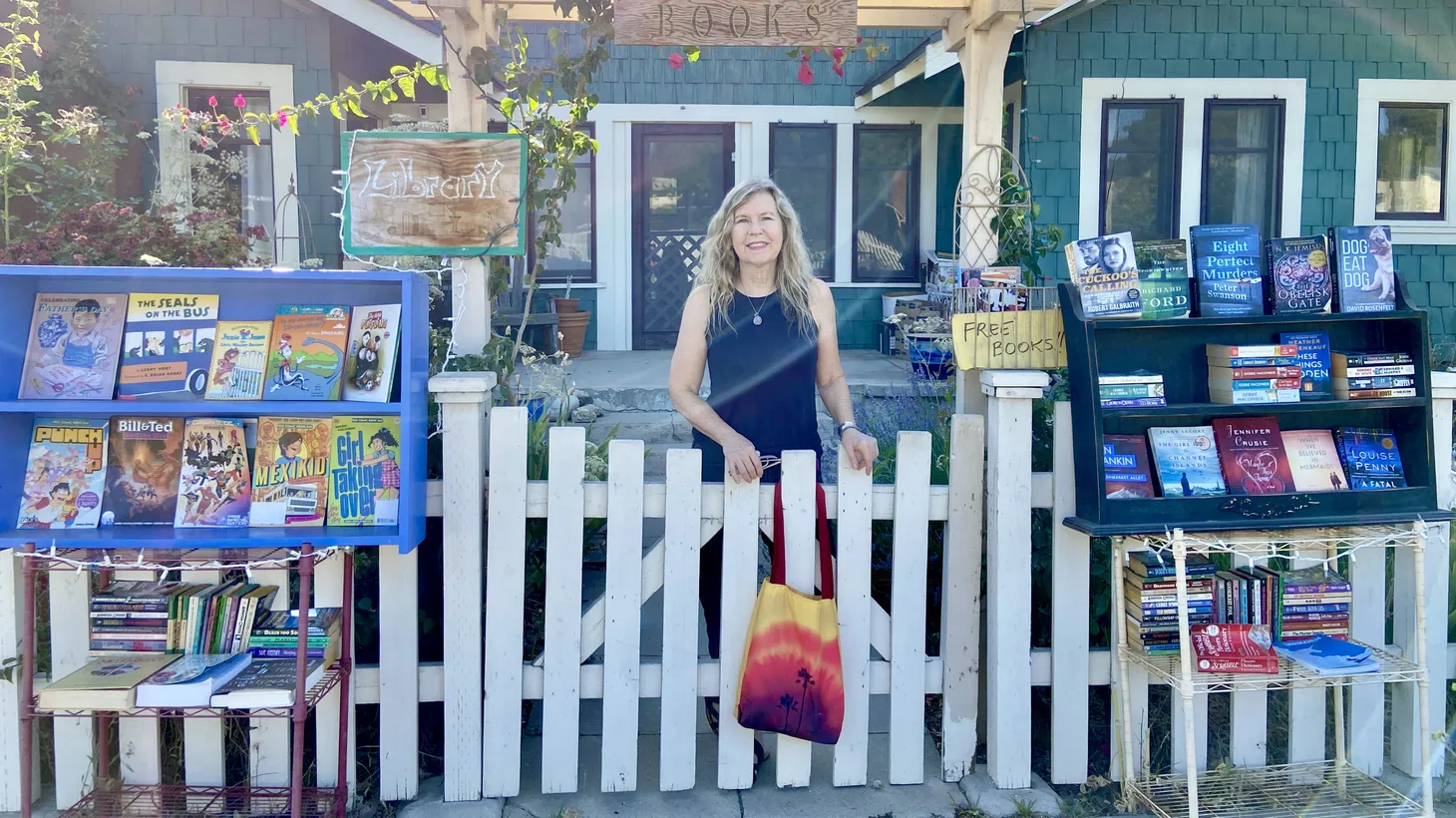 Author Susan Straight stands in front of the neighborhood library outside her Riverside home.
