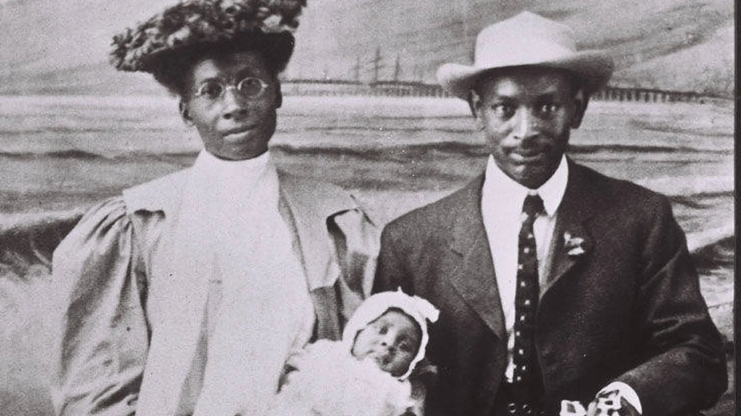 Selena McDonald Brunson and Charles E.A. Brunson hold baby Donald A. Brunson, the first African American child born in Santa Monica, in a 1907 photograph taken on the Santa Monica Pier. Members of the Brunson family later lost property in Santa Monica when the 10 freeway was built.