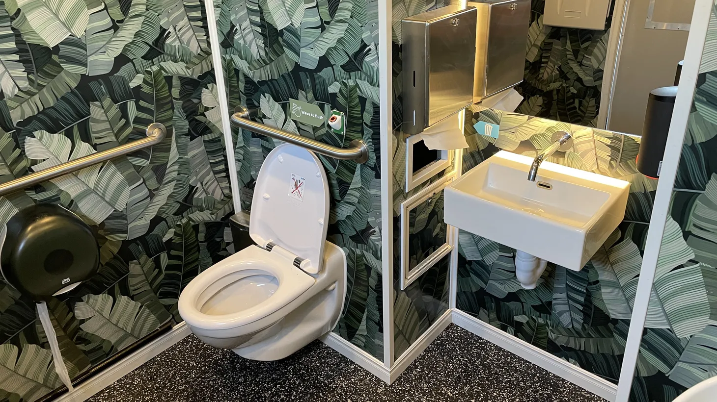 The touchless “Throne” restroom installed at the Westlake/MacArthur Park Metro station features jungle-themed plant wallpaper.