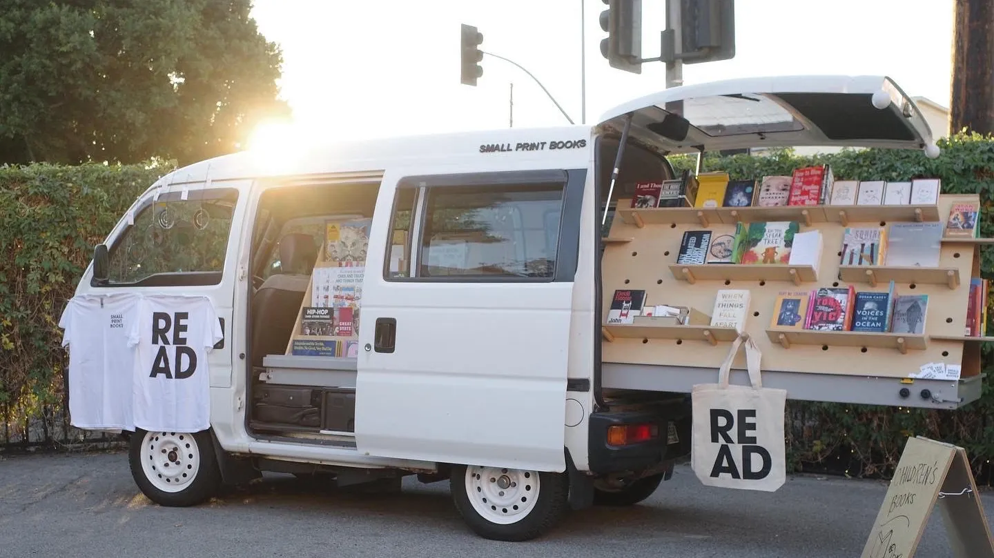 Small Print Books operates out of a Japanese microvan about the size of a golf car.