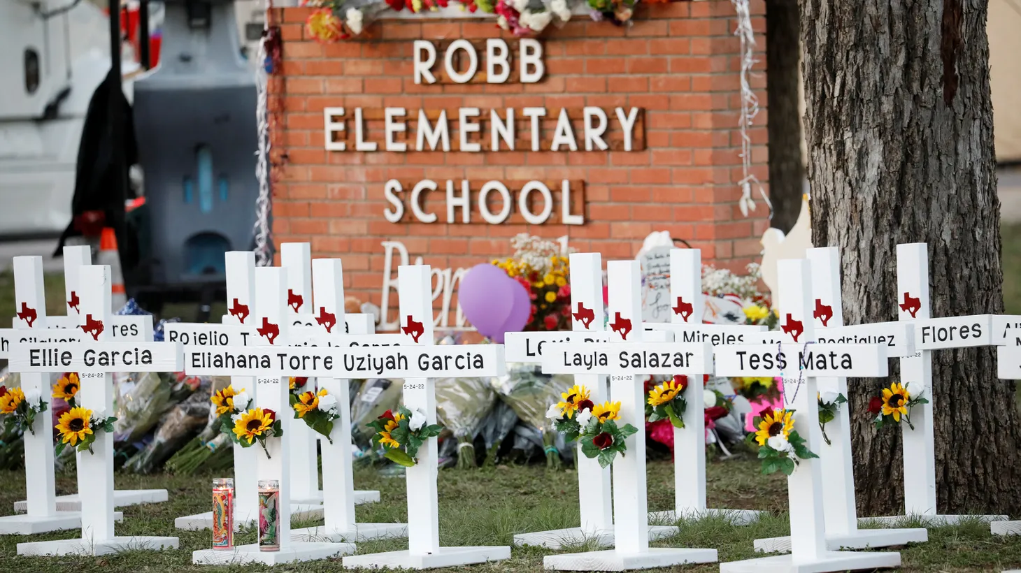 Crosses bear the names of people who died during a recent shooting at Robb Elementary School in Uvalde, Texas, May 26, 2022.