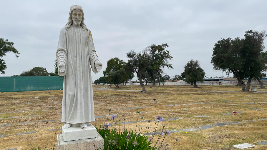 Southern California’s drought restrictions have turned the grass brown at Lincoln Memorial Park Cemetery.