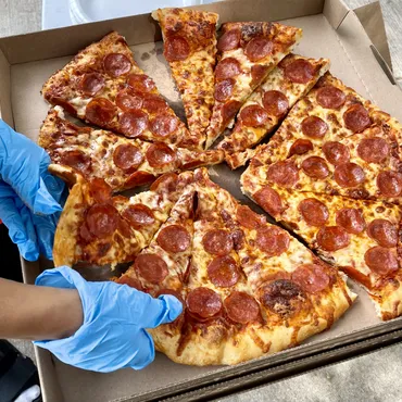 The Pizza Strike Fund is a grassroots effort to feed Hollywood writers and actors. Volunteers have delivered over 2,500 cheesy and meaty pies to picket lines since May.