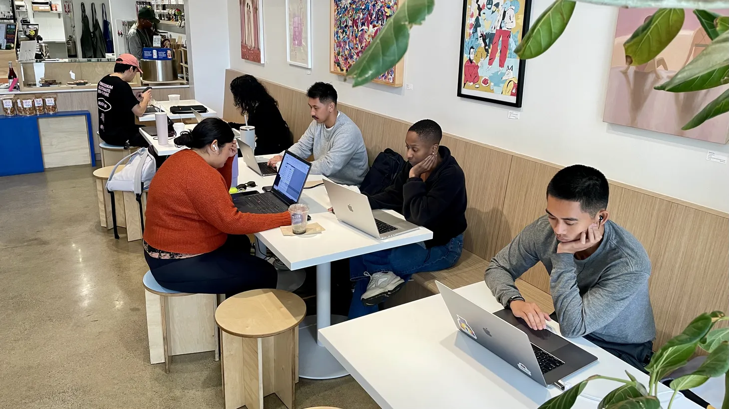 Remote workers use Open Market in Koreatown as a shared office space during an event hosted by LA in Common. Groups like these are working out deals with restaurants and coffee shops to host coworking pop-ups.