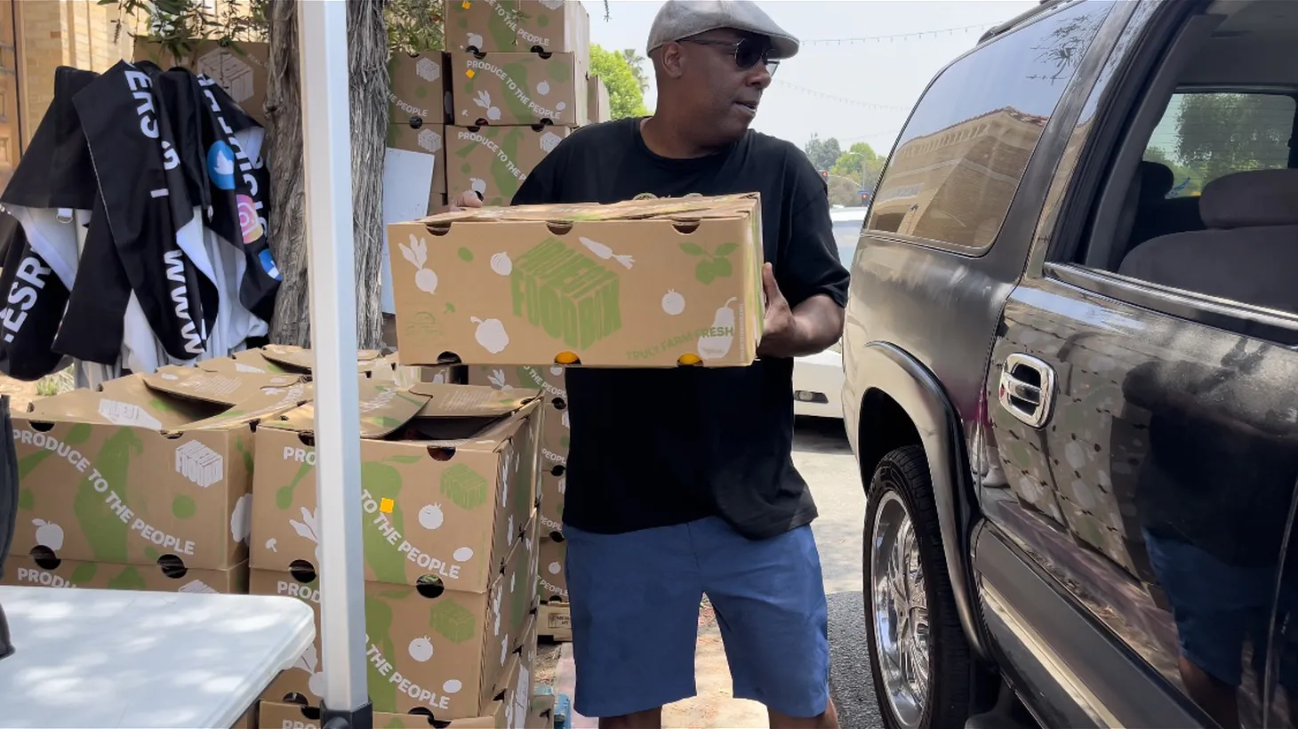 Volunteers with East Side Riders Bike Club give out boxes of food every Wednesday at their Watts location. Lately they’ve seen more demand as inflation drives up food prices. Photo courtesy of East Side Riders Bike Club President John Jones III.