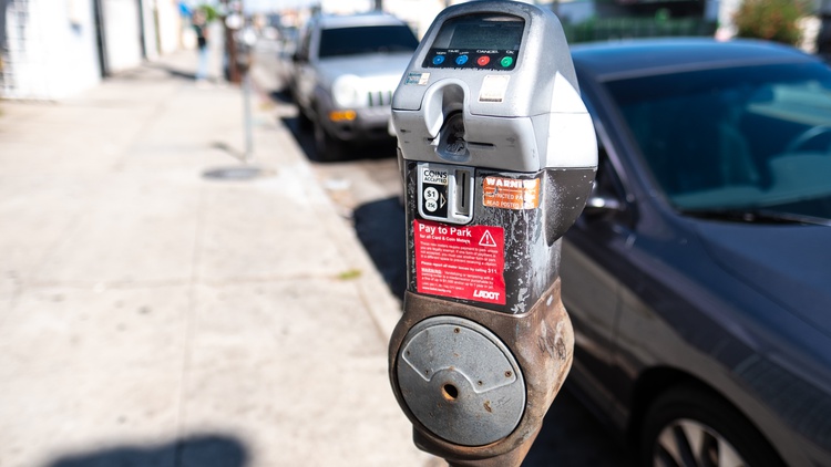 The City of LA is temporarily pausing impounds of cars that have been issued more than five parking tickets after a Koreatown resident sued the city over its impounding practices.