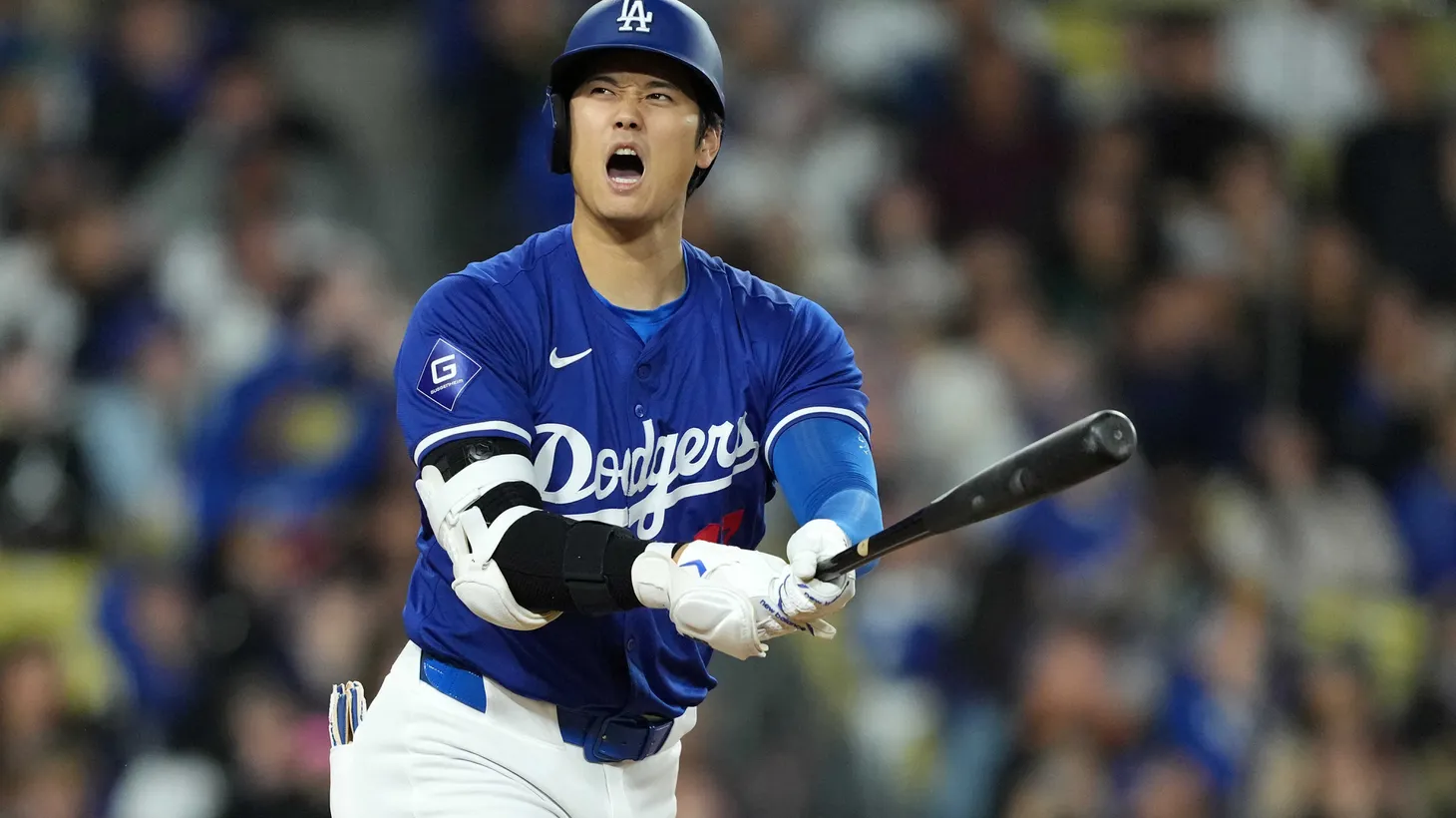 Los Angeles Dodgers designated hitter Shohei Ohtani (17) bats in the fourth inning against the Los Angeles Angels at Dodger Stadium, Mar 25, 2024.