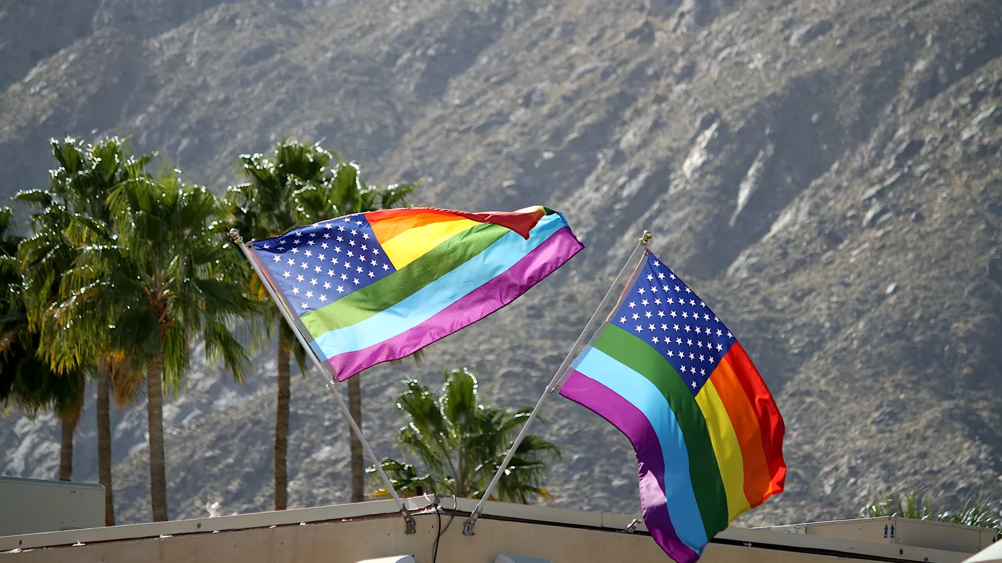 Gay pride rainbow flags fly along Arenas Street in Palm Springs, California. The city will be represented by GOP Congressman Ken Calvert, thanks to redistricting. Some residents are worried about his anti-LGBTQ voting history.
