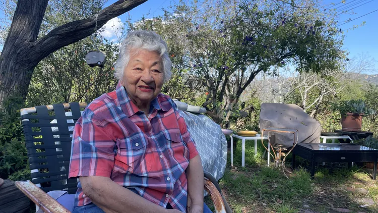 Topanga is one of the riskiest places in LA County for fires and floods. One of the area’s oldest residents explains why she still calls it home after 92 years.