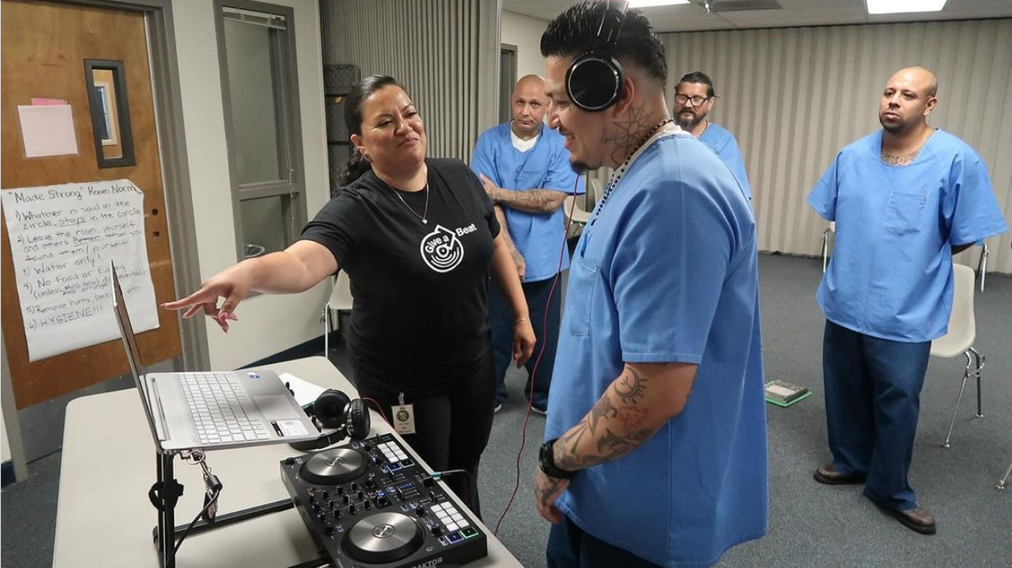 Angela “Spiñorita” Ramirez works with students at the California Rehabilitation Center. “Getting to know these guys and sharing music has been the biggest highlight of my year,” she says.
