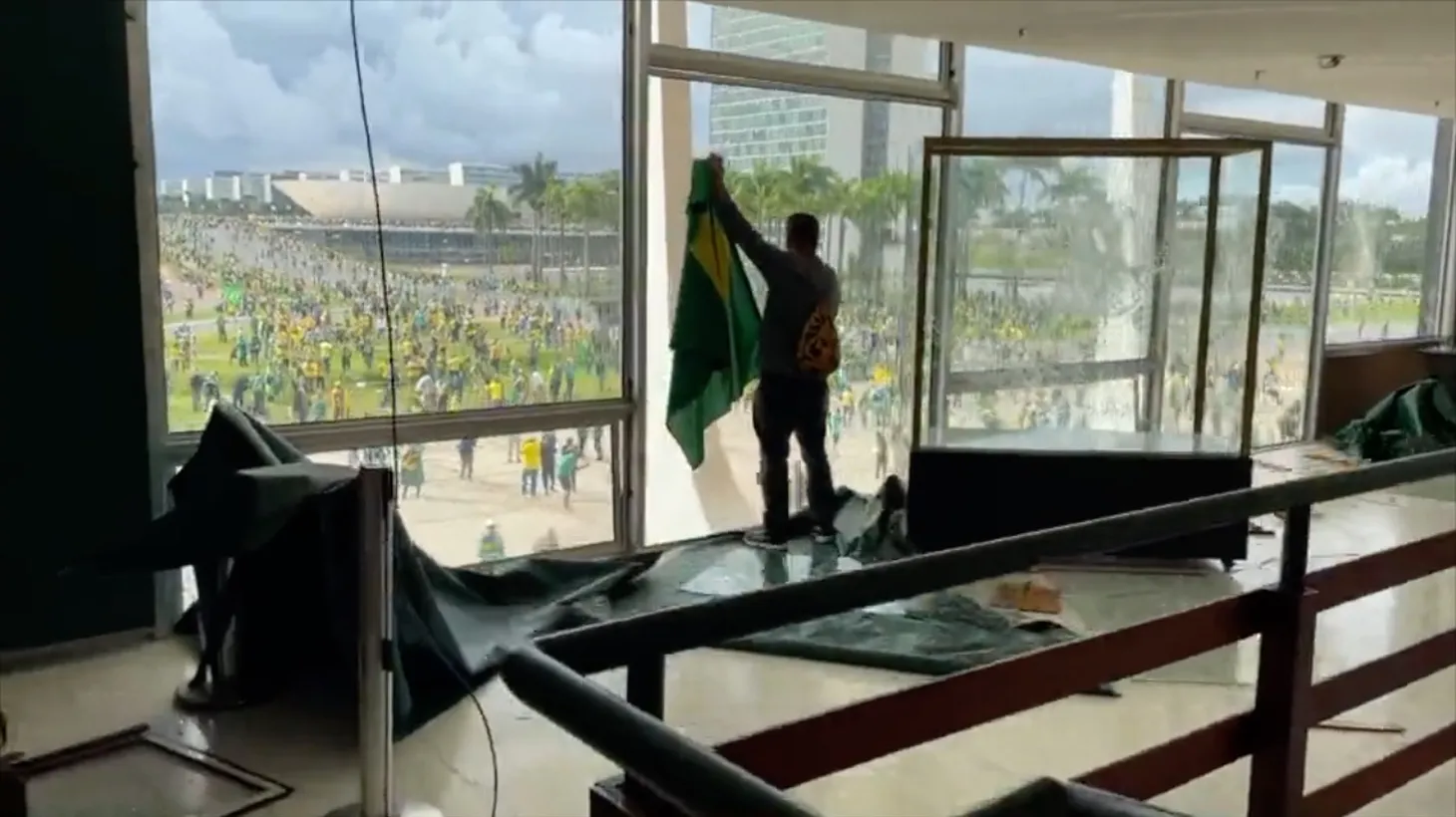 Supporters of Brazil's former president Jair Bolsonaro storm the National Congress and Supreme Court in the capital Brasília on Sunday Jan 8, 2023.