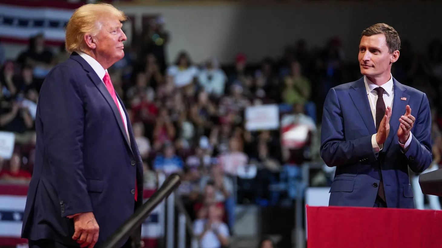 Blake Masters, candidate for U.S. Senate, right, speaks after being invited onstage by former President Donald Trump, left, during a Save America rally at the Findlay Toyota Center on July 22, 2022, in Prescott Valley.