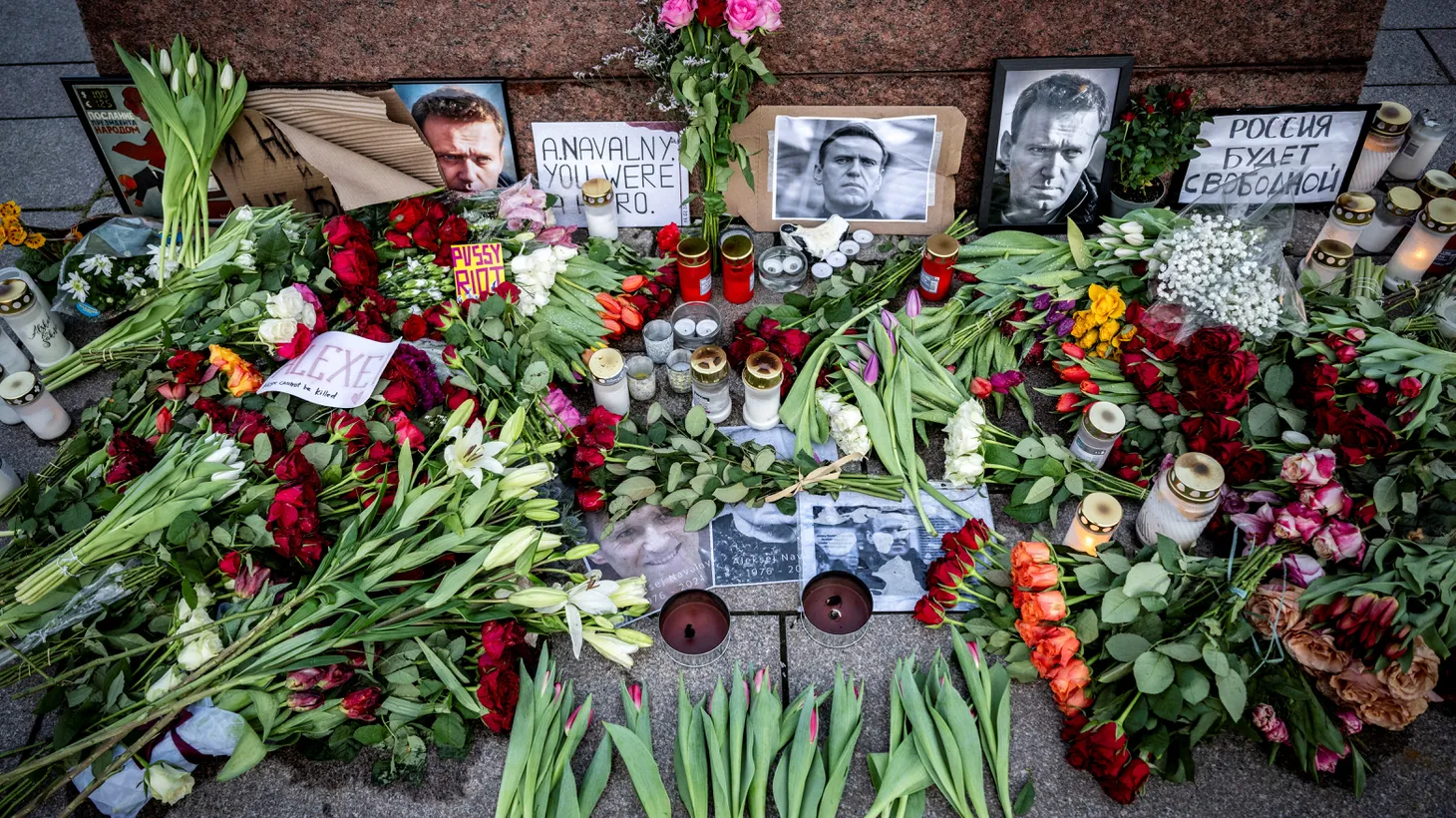 A memorial site for Alexei Navalny was set up at Carl Fredrik Reutersward's sculpture “Non-Violence” in Malmo, Sweden, February 20, 2024.