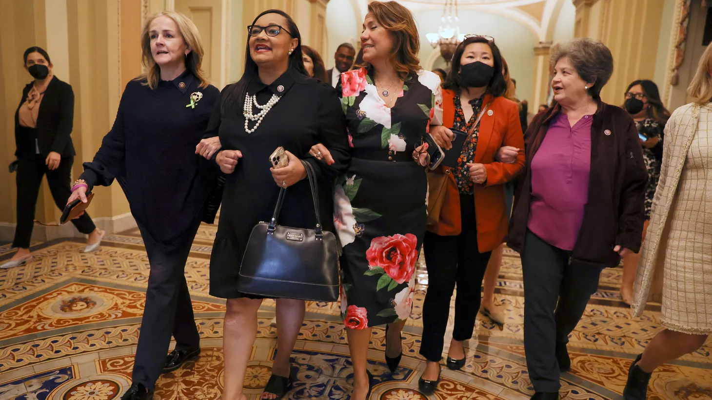 U.S. Rep. Madeleine Dean (D-PA), Rep. Nikema Williams (D-GA) and Rep. Veronica Escobar (D-TX) lead a march of Democratic women members of the U.S. House of Representatives around the Senate Chamber to protest abortion rights in Washington, U.S. A measure to codify Roe v. Wade failed 51-49 in the Senate on May 11, 2022.