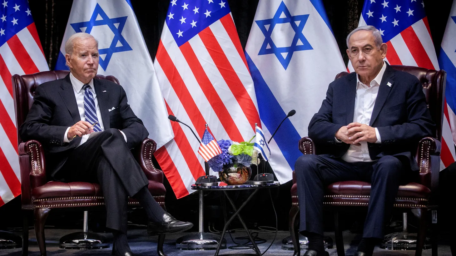 U.S. President Joe Biden, left, pauses during a meeting with Israeli Prime Minister Benjamin Netanyahu, right, to discuss the war between Israel and Hamas, in Tel Aviv, Israel, on Wednesday, Oct. 18, 2023.