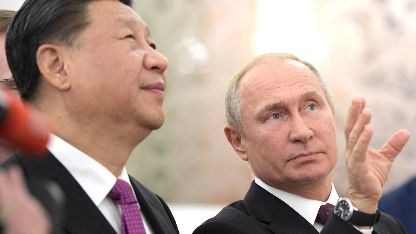 Russian President Vladimir Putin meets with Chinese President Xi Jinping.
