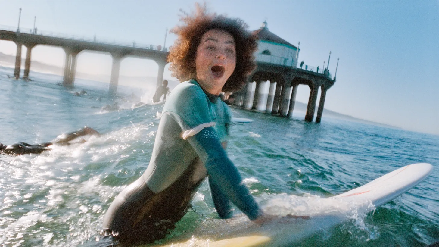 Kimiko Lorraine Russell-Halterman surfs in Manhattan Beach in 2021.