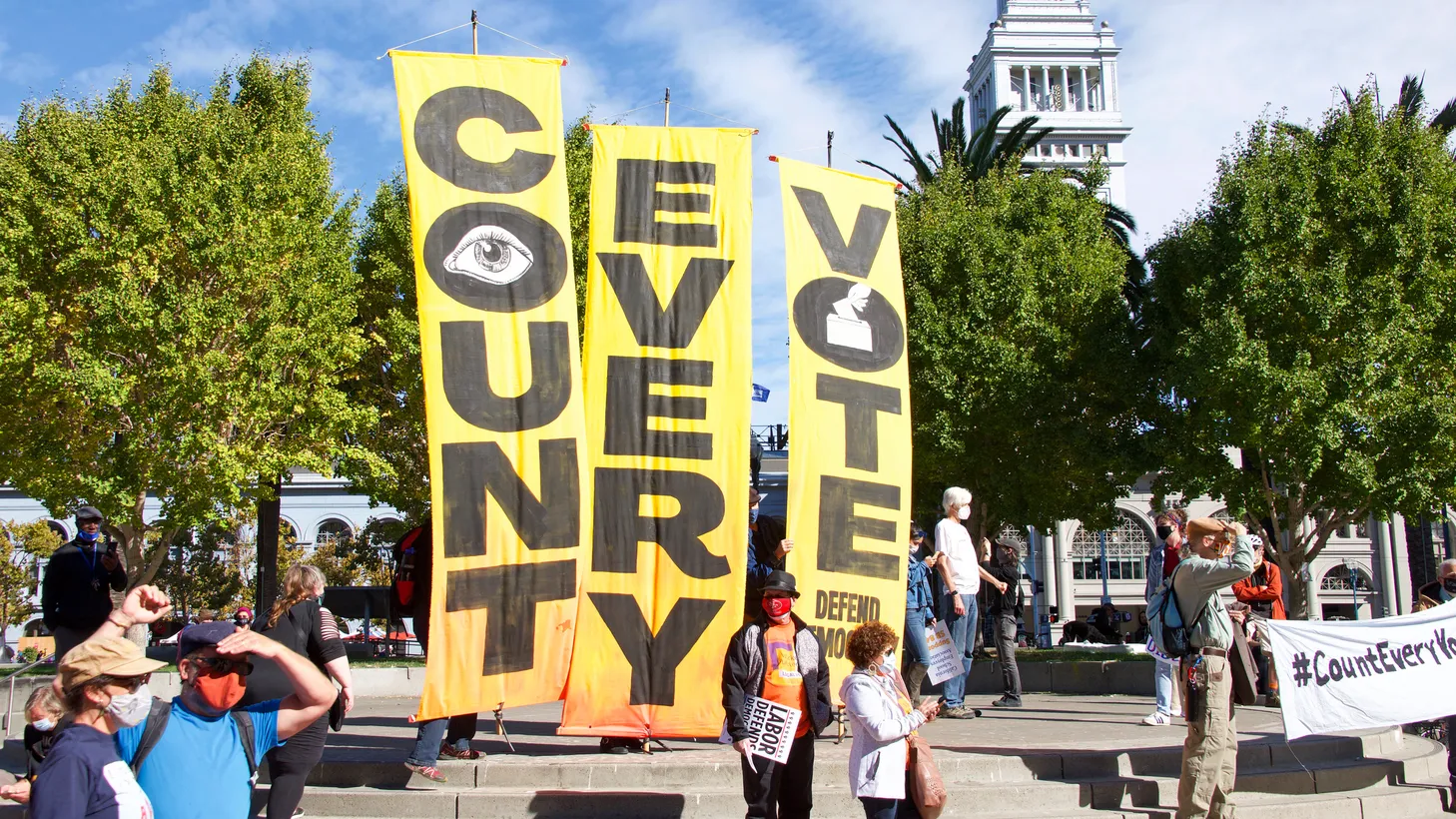 Banners say “count every vote” in San Francisco, November 2020.