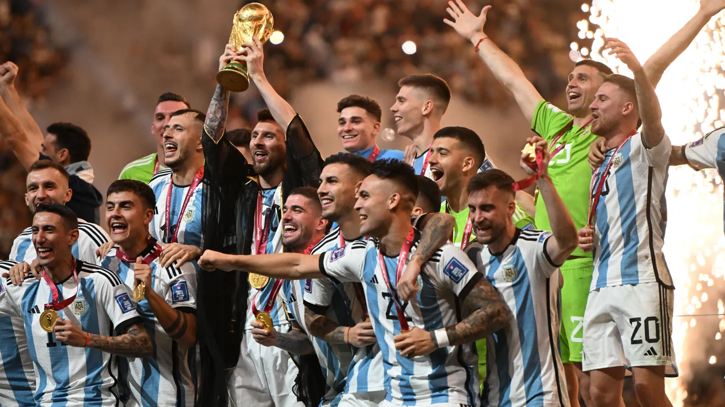 Lionel Messi (10) and Argentina players celebrate after winning the FIFA World Cup Qatar 2022 final match against France at Lusail Stadium on December 18, 2022 in Lusail, Qatar.