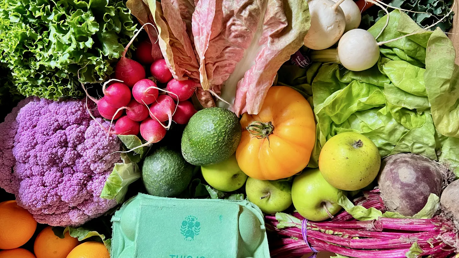 These colorful vegetables and fruits are from a Flamingo Estate produce box.