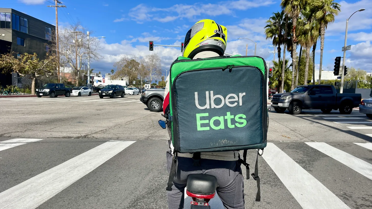 An Uber Eats driver in Venice is making a delivery, February 26, 2023.