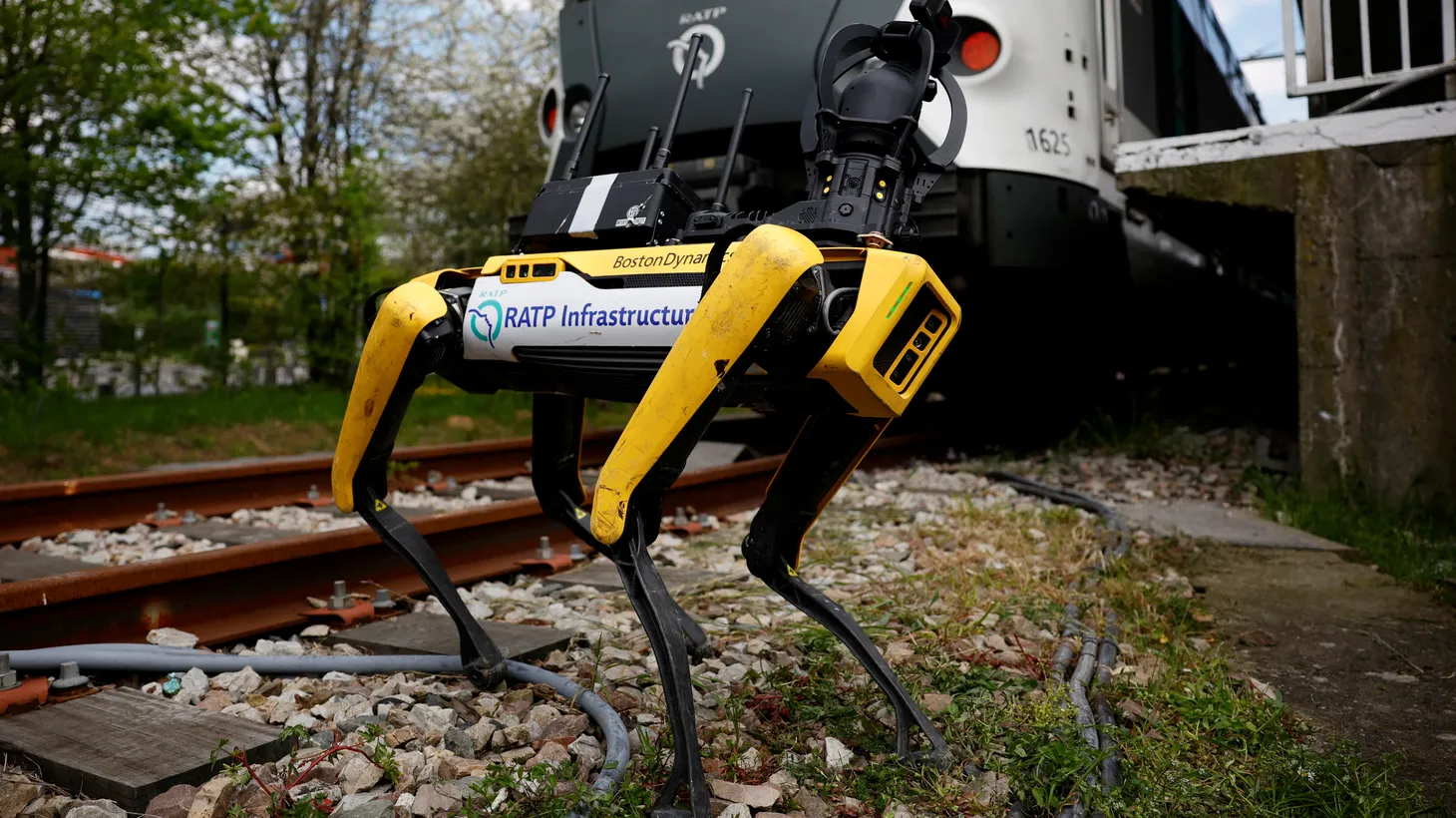 A robot dog, developed by Boston Dynamics, inspects a suburban rapid transit dock near Paris, France, April 18, 2023.
