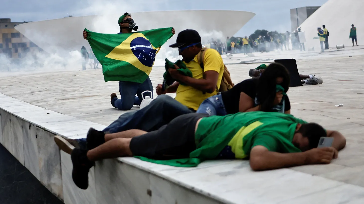 Supporters of Brazil's former President Jair Bolsonaro react during a demonstration against President Luiz Inacio Lula da Silva, outside Planalto Palace in Brasilia, Brazil, January 8, 2023.
