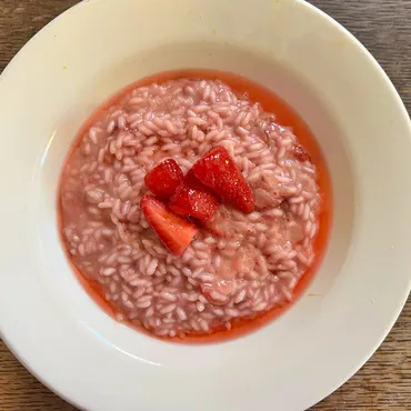 To celebrate spring, make one risotto with the triad of spring vegetables —  asparagus, leeks and peas — and another one with strawberries.