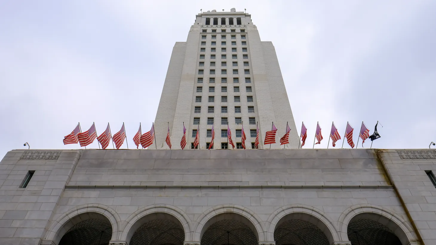 LA City Hall is seen on a cloudy day.
