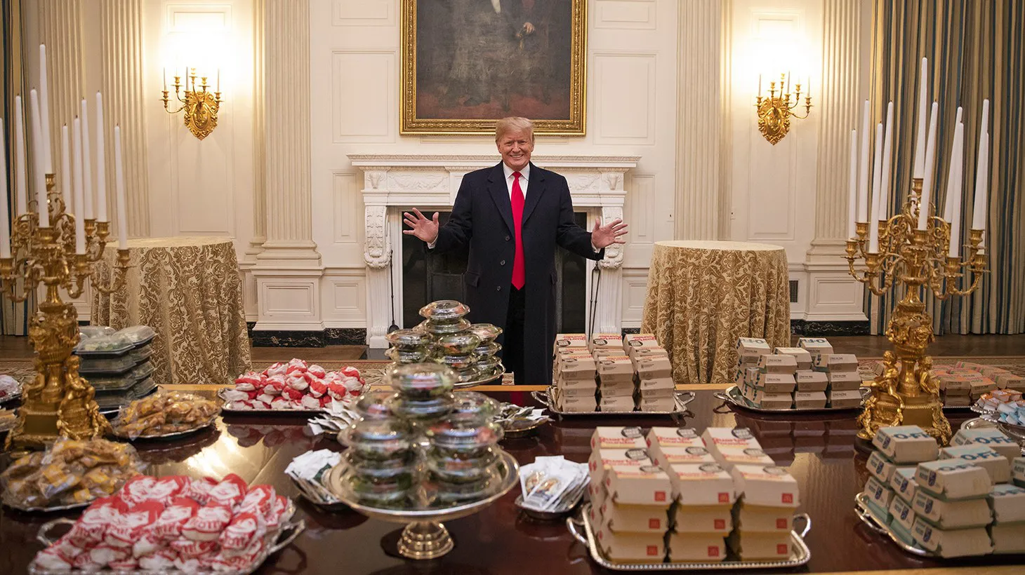 President Donald Trump bought a fast food feast – pizza, hundreds of hamburgers, and boxes of french fries – to celebrate the Clemson football team’s national championship win during the government shutdown in 2019. Credit: Official White House.