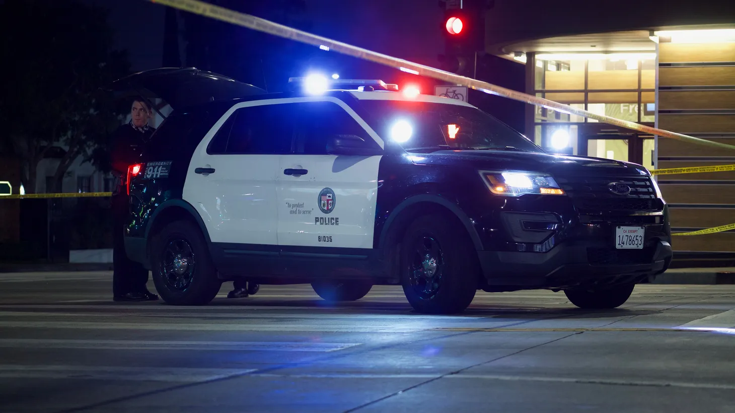 A Los Angeles Police Dept. car blocks Sunset Blvd. following a fatal officer-involved shooting, April 24, 2021.