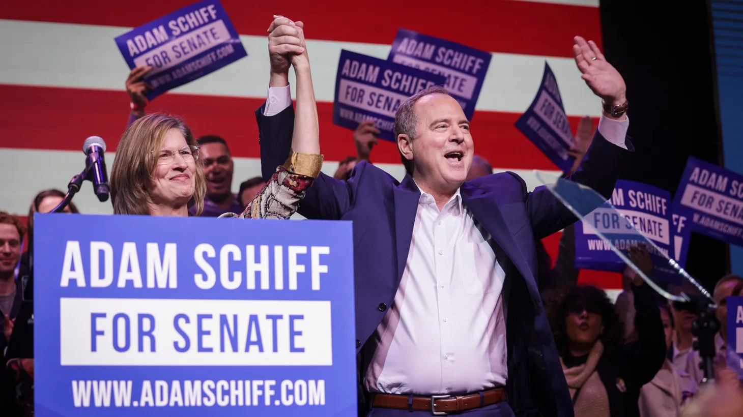 Eve Schiff and Adam Schiff wave at the crowd at a campaign event, after Schiff advances in the California runoff Senate race on March 5, 2024.