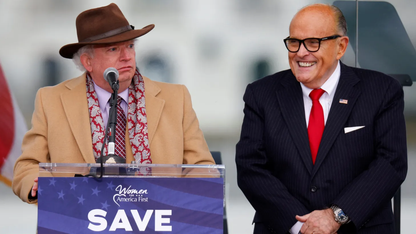 Attorney John Eastman speaks next to U.S. President Donald Trump's personal attorney Rudy Giuliani, as Trump supporters gather ahead of the president’s speech to contest the certification of the results of the 2020 U.S. presidential election on the Ellipse in Washington, U.S, January 6, 2021.