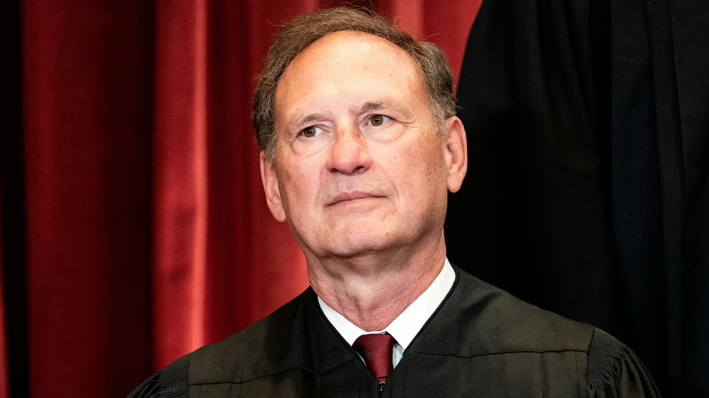 Associate Justice Samuel Alito poses during a group photo of the justices at the Supreme Court in Washington, U.S., April 23, 2021.