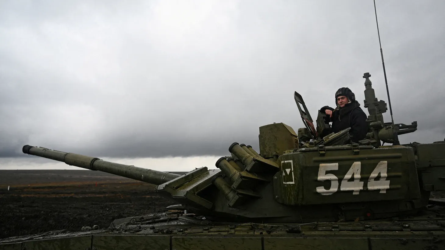 A Russian service member is seen atop a T-72B3 main battle tank during military drills at the Kadamovsky range in the Rostov region, Russia, December 20, 2021.