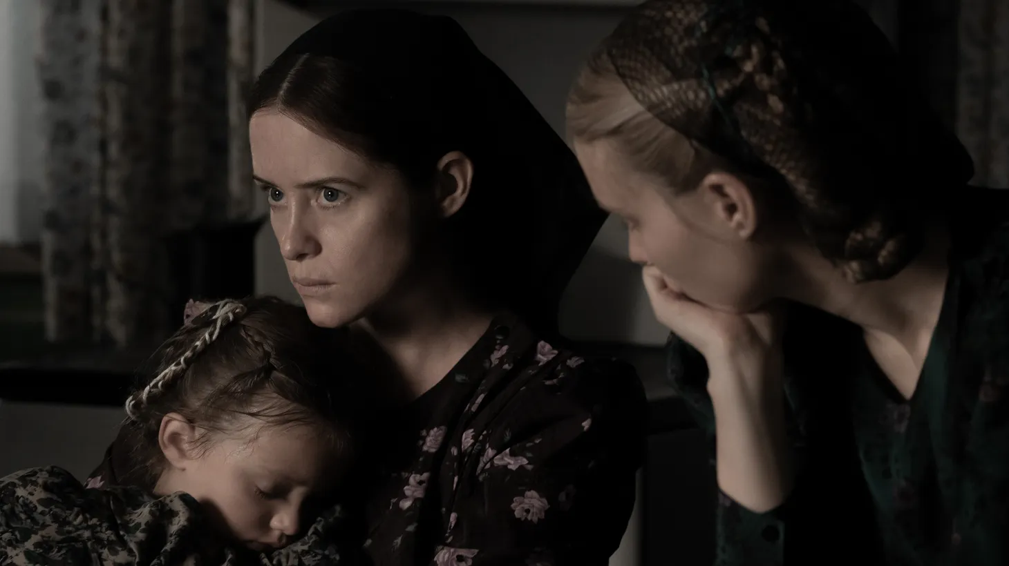 L to R: Emily Mitchell stars as Miep, Claire Foy as Salome, and Rooney Mara as Ona in “Women Talking.”