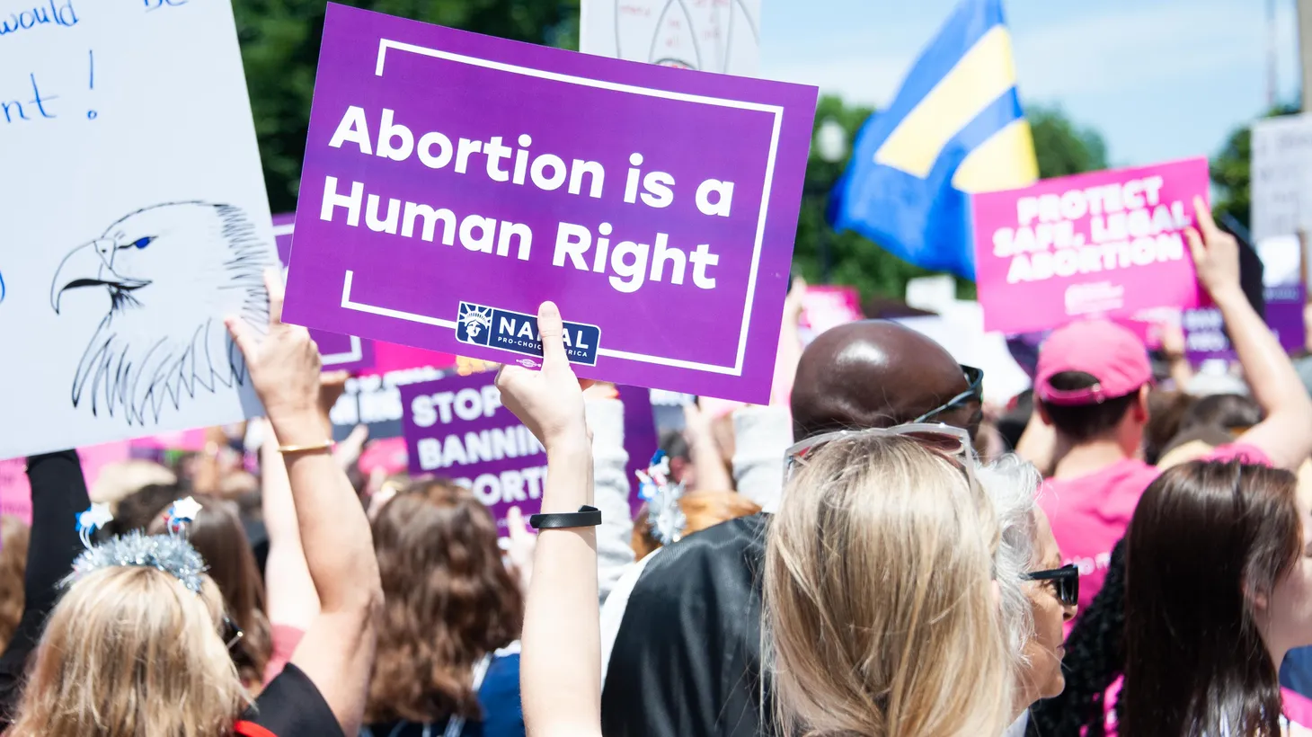 An activist holds a sign that says, “Abortion is a human right,” in Washington D.C., May 21, 2019.