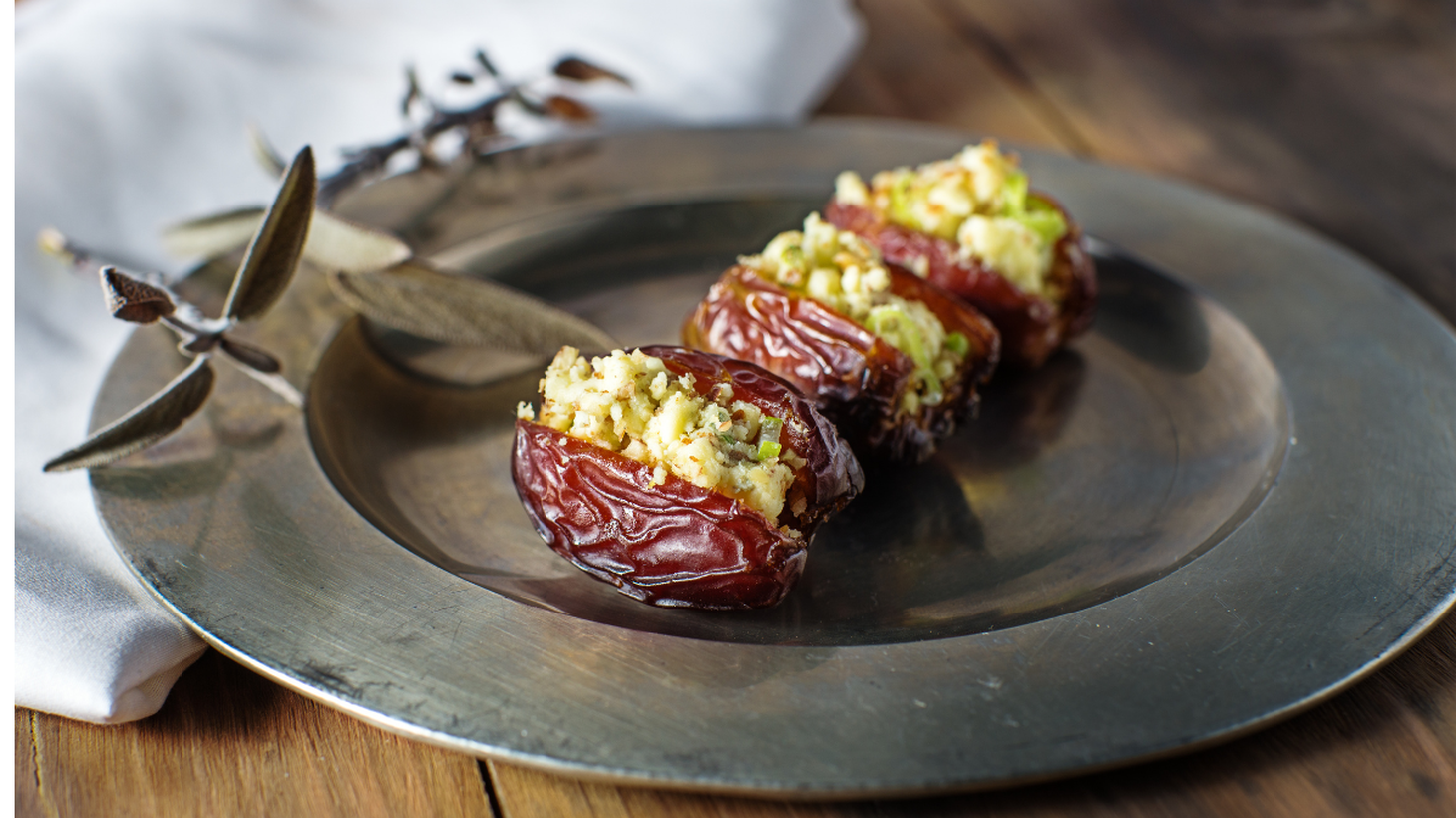 Dates filled with goat cheese are an easy appetizer for the spring holidays.
