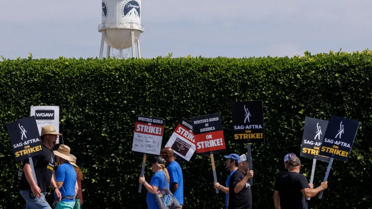 Hollywood’s below-the-line workers are not on strike, but they’re still out of work as writers and actors walk the picket lines.