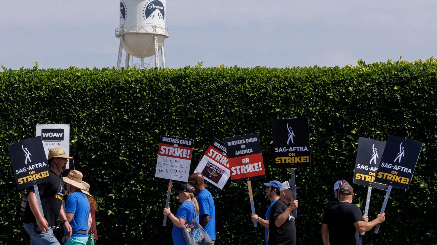 SAG-AFTRA actors and Writers Guild of America (WGA) writers walk the picket line in front of Paramount Studios in Los Angeles, California, U.S., July 17, 2023.